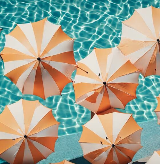 enhance poolside paradise with umbrellas